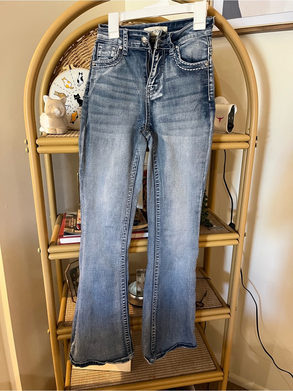 Light Wash Flare Jeans with Subtle Distressing